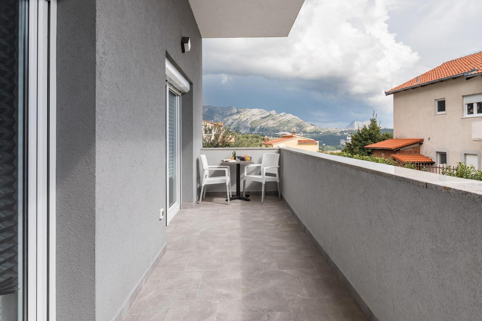 Apartments Villa Salona Sky Pokoj fotografie